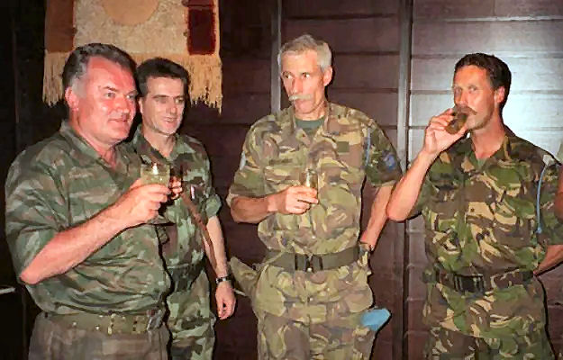 Meeting of Serbian general Ratko Mladić and Dutch colonel Thom Karremans in Srebenica on 11. July 1995, during this picture and untill the 19. Mladić directed there a massacre, therefore he died in Den Haag Prison.