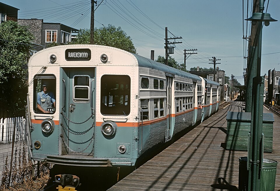 These were early 6000 series cars with double headlights and a top center rollsign.  The 6000s were rebuilt PCC streetcars.  Roger's photo show them holding down a Ravenswood run in July, 1965.  For more on these cars see: http://www.chicago-l.org/trains/roster/6000.html
A Roger Puta Photograph