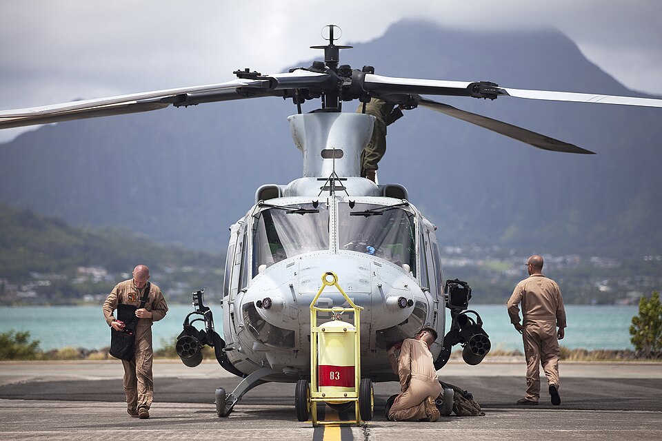 Aircrew Marines with Marine Light Attack Helicopter Squadron 367 conduct a pre-flight inspection on a UH-1Y Huey helicopter at Marine Corps Air Station Kaneohe Bay, Hawaii, before a maintenance and readiness flight, June 13, 2013. The training was designed to challenge aircraft maintenance crews to 