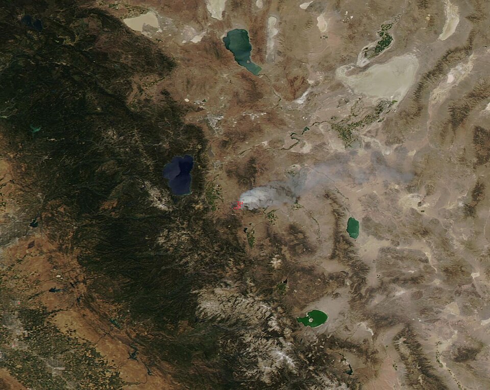 On July 6, 2020, residents living east of Gardnerville, Nevada, noticed a robust emergency response to a small fire that had sparked in grass, brush, and pinyon juniper. Within 24 hours the explosive fire had scorched 17,296 acres and consumed one structure and 10 outbuildings. The Moderate Resoluti