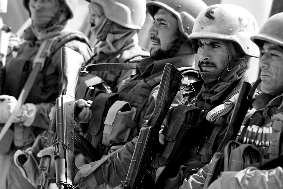 Afghan national security forces personnel prepare for a visit from Bismullah Khan, Afghanistan's interior minister, Lt. Gen. Mohammed Akram, deputy minister of defense, and Lt. Gen. David Rodriguez, commander of ISAF Joint Command, in Kandahar May 10. Khan and Akram also spoke during a press confere