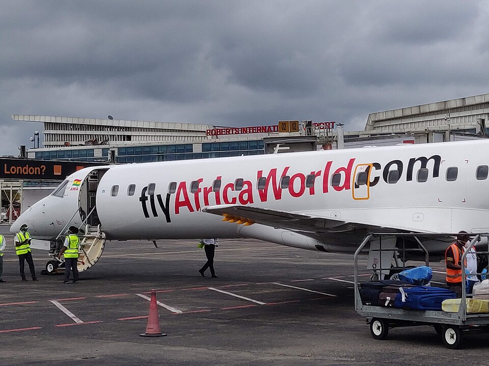 An Africa World Airlines Embraer 145 parked at the new international terminal at Roberts Internation