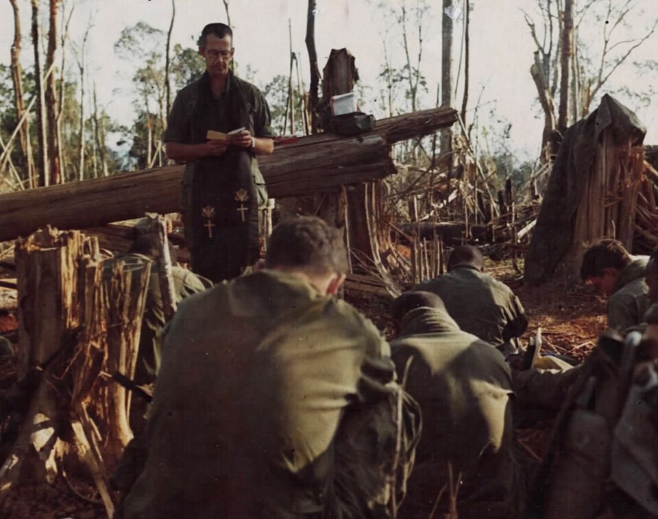 Members of Companies A, B, and D, 1st Battalion, 173rd Airborne Brigade, prepare to move off of Hill 800, located 12 miles northwest of Dak To, one of the many that has been searched during Operation MacArthur. The main objective of the operation is to sweep and clear the highlands around Dak To of 