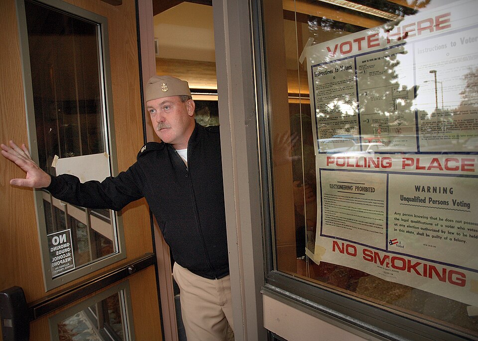 Oak Harbor, Wash. (Nov. 2, 2004) - Master Chief Aviation Electronics Mate Edward Betz departs a voters polling place at Oak Harbor School District Administration Building 201, after placing his ballot in the nation-wide Election 2004. Betz is assigned to the “Shadowhawks” of Electronic Attack Squadr