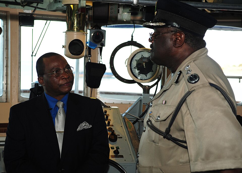 Henry W. Christian, deputy commissioner of operations for the Royal Police Force of Antigua and Barbuda, conducts an interview regarding Exercise Tradewinds 2011 with Dave Lester Payne of Good Morning Antigua on the bridge of the U.S. Coast Guard Cutter Diligence, March 7, 2011. CGC Diligence, homep