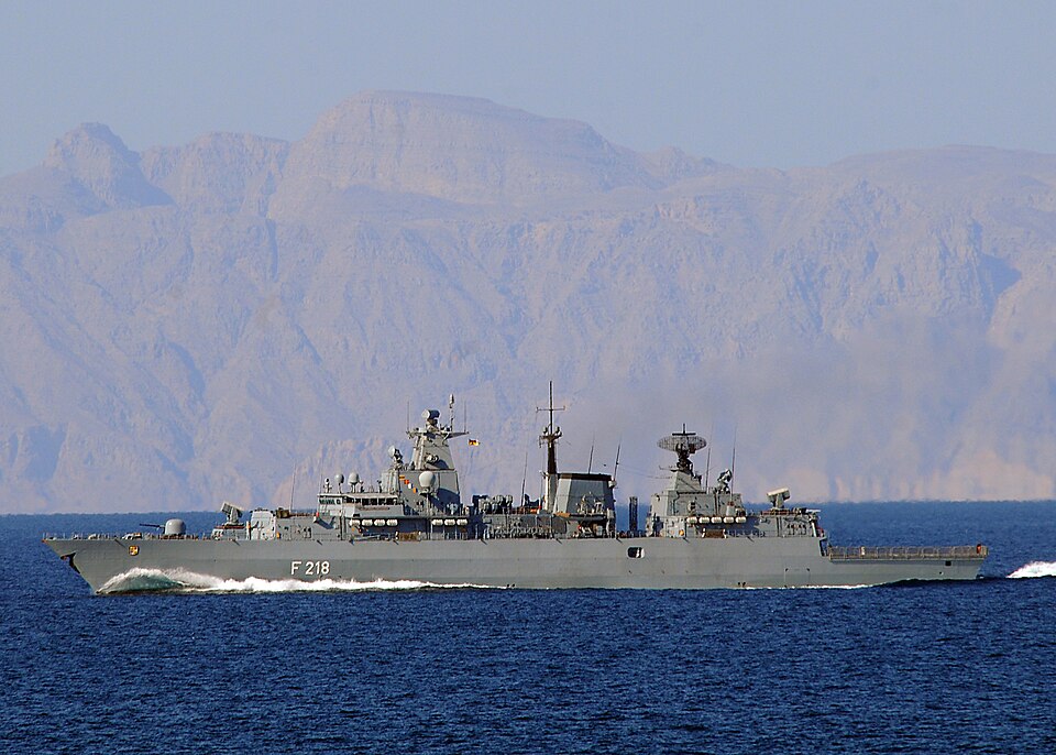 090116-N-1082Z-011 STRAITS OF HORMUZ (Jan. 16, 2008) The German frigate Mecklenburg-Vorpommern (F 218) transits the Strait of Hormuz near the guided-missile cruiser USS Vella Gulf (CG 72). Mecklenburg-Vorpommern is a Brandenburg class frigate.